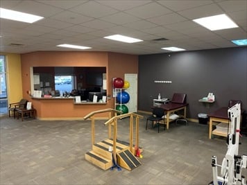 Front desk check-in and therapy area