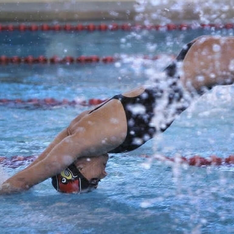 Grite diving into the pool.